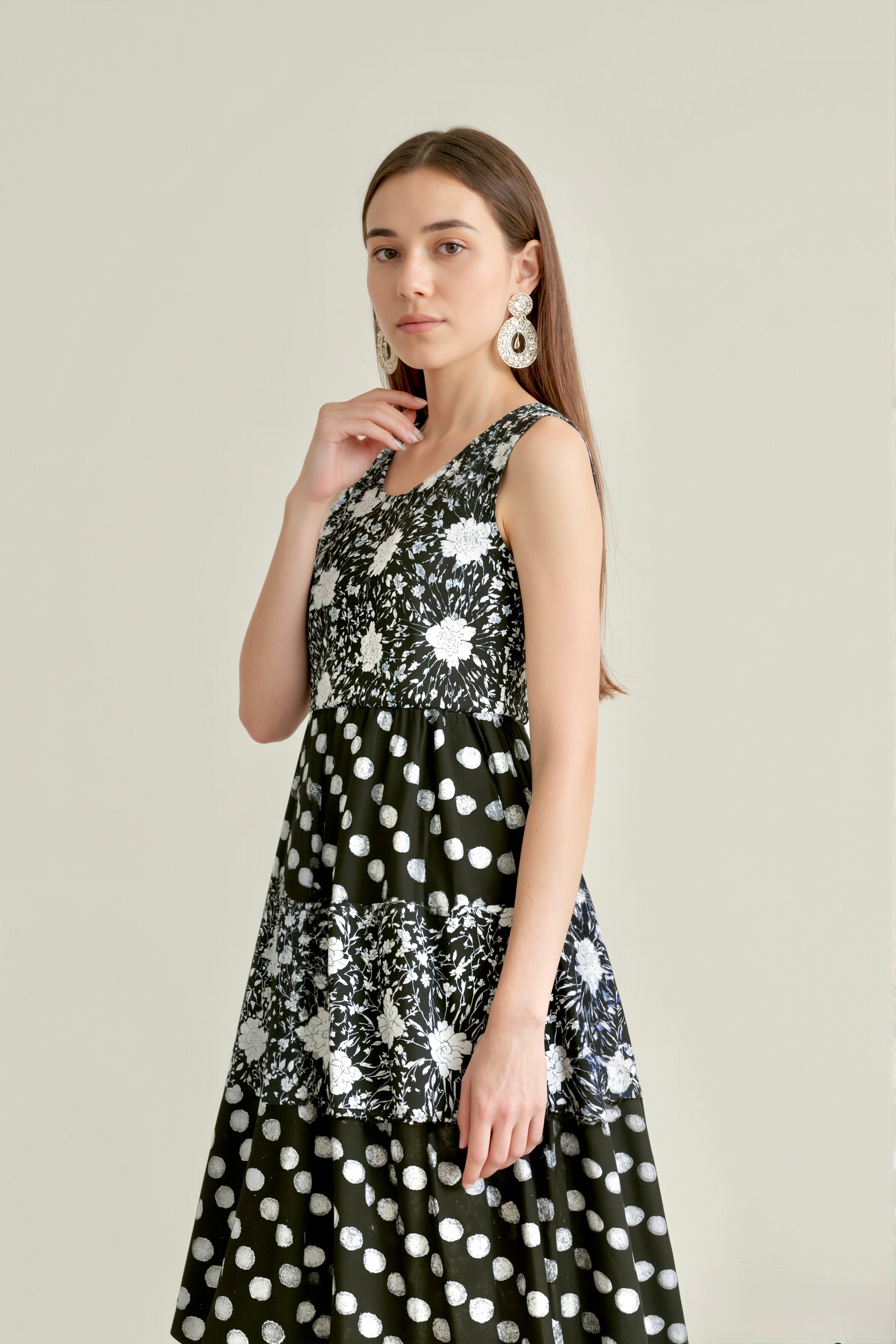 Patterned Harmony: Sleeveless Mixed-Print Midi Dress