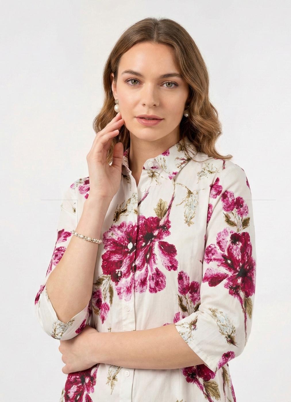 Woman wearing pink printed cotton dress.