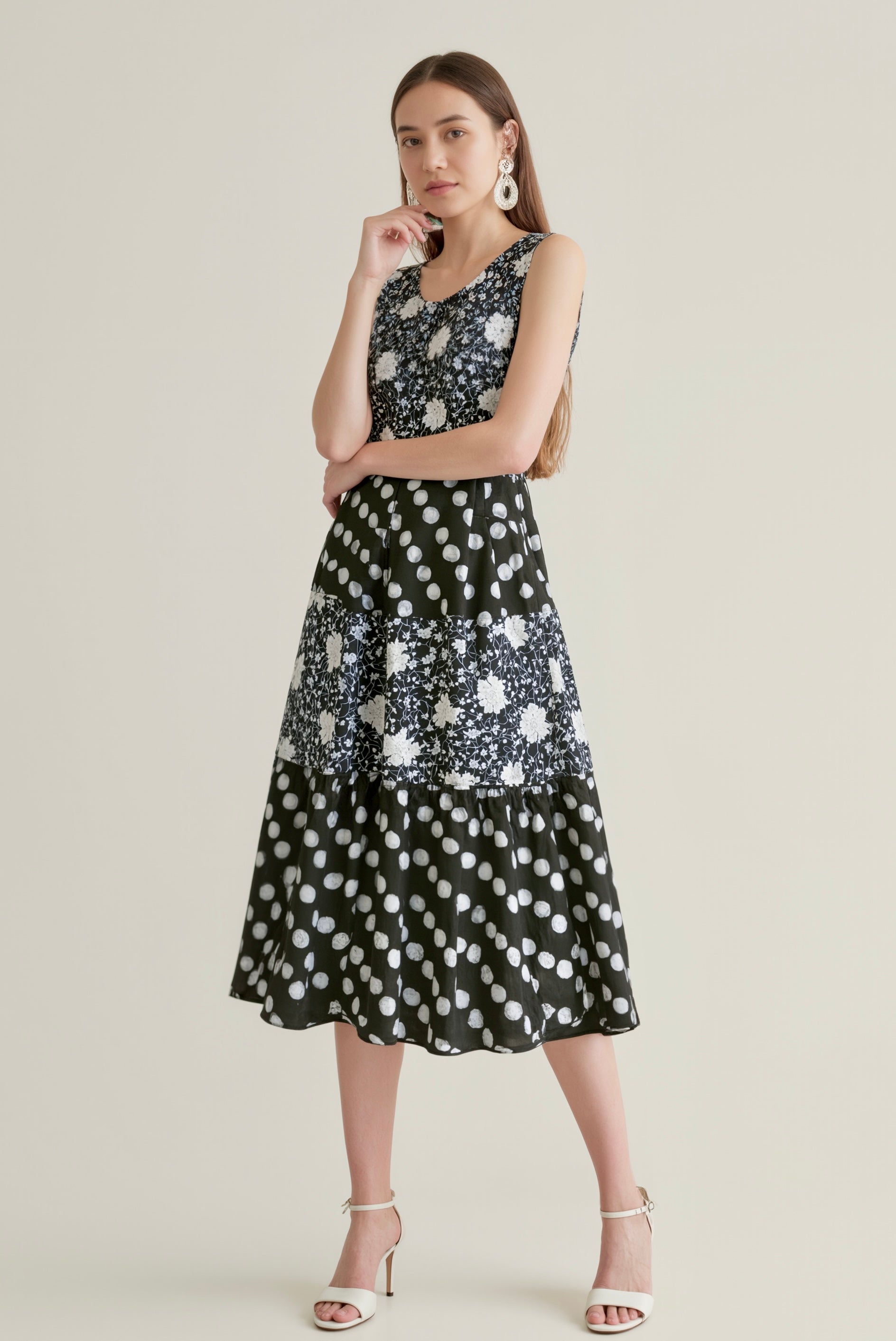Patterned Harmony: Sleeveless Mixed-Print Midi Dress